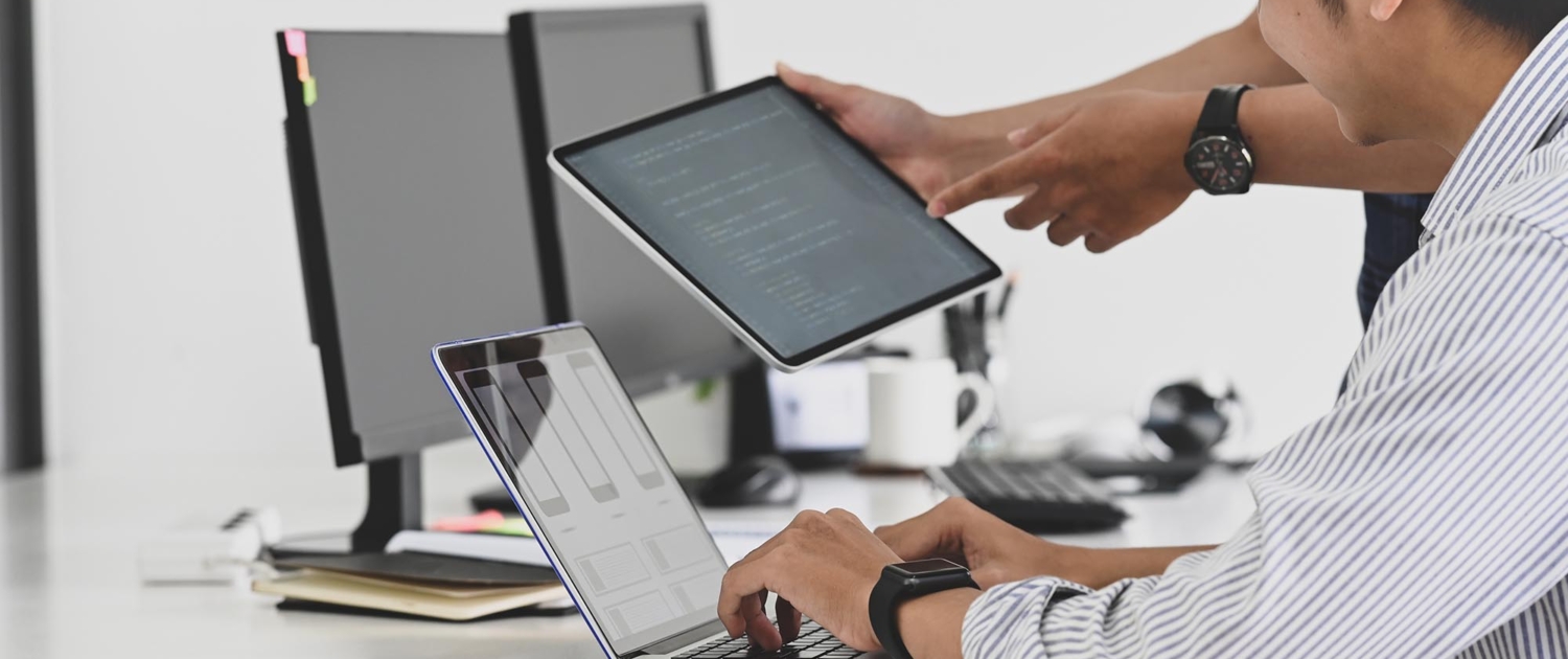 Medical professionals looking at computers